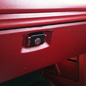 locking glove box latch with chrome tabs