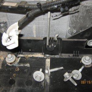 remove battery box bolts (lh)