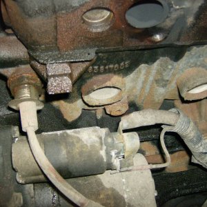 remove starter for access to drain plug on block