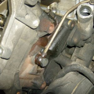remove fuel line from front of heads