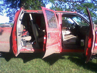 9 passengers, three rows of tan leather
