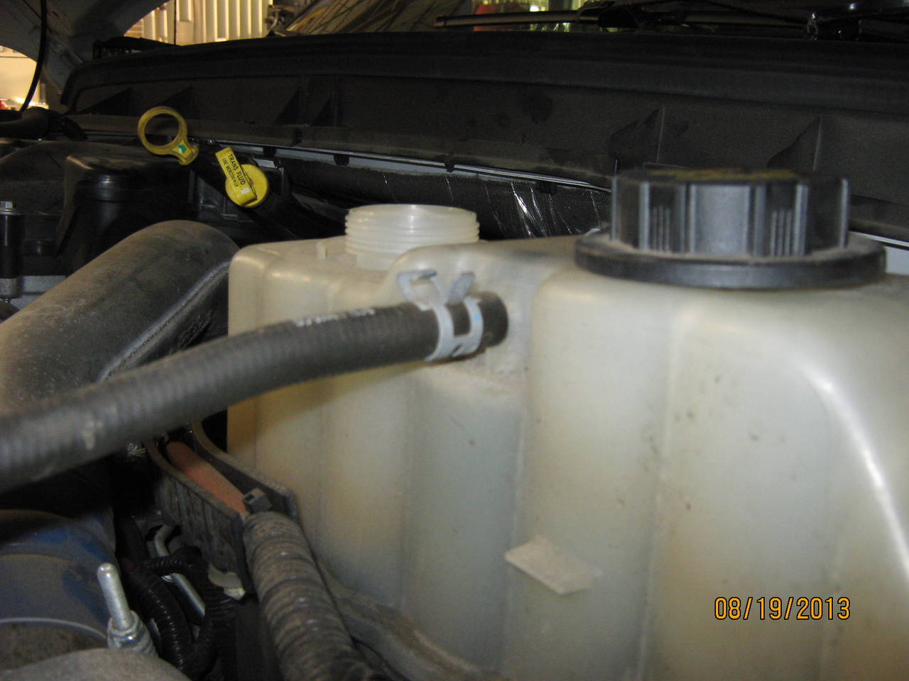 disconnect top small hose