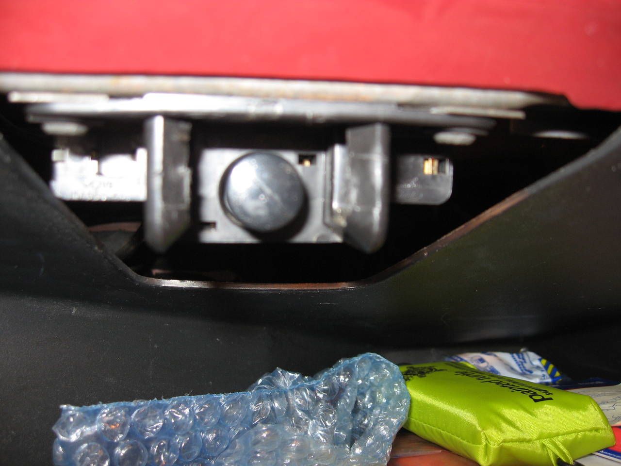 Glove box light switch