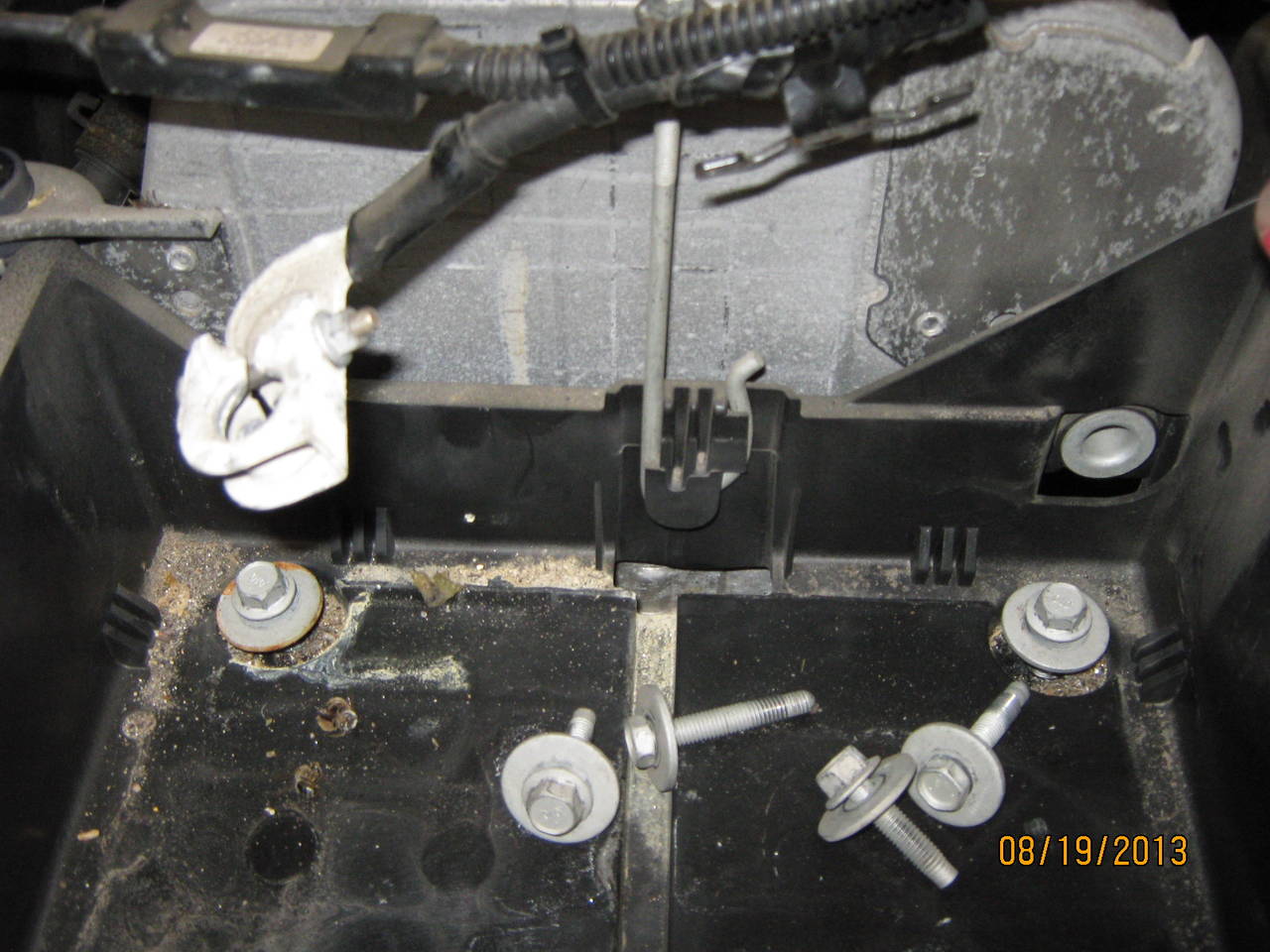 remove battery box bolts (lh)
