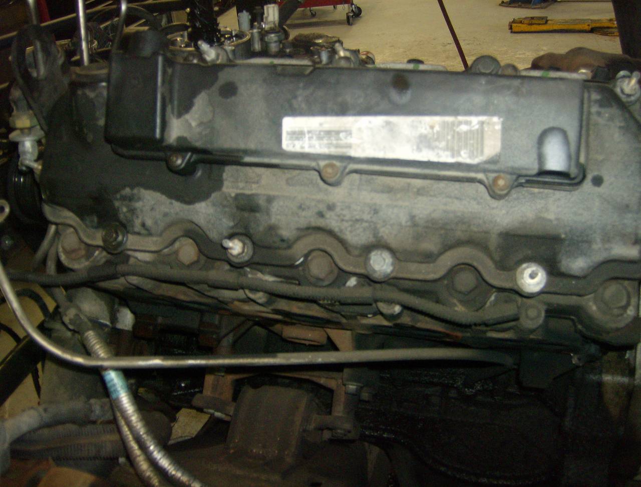 remove exhaust manifold (dipstick wont come out)