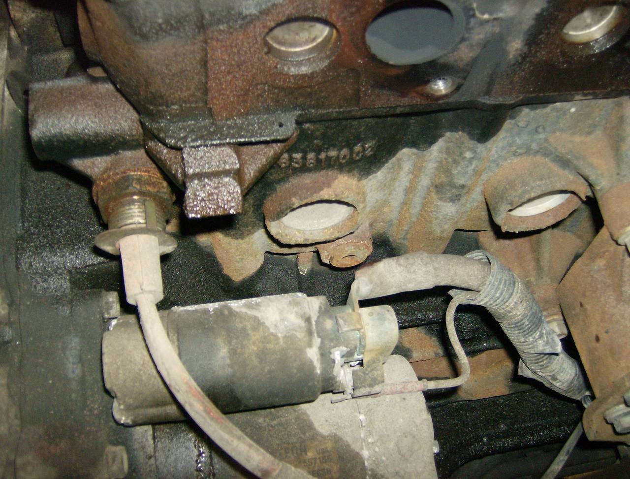 remove starter for access to drain plug on block