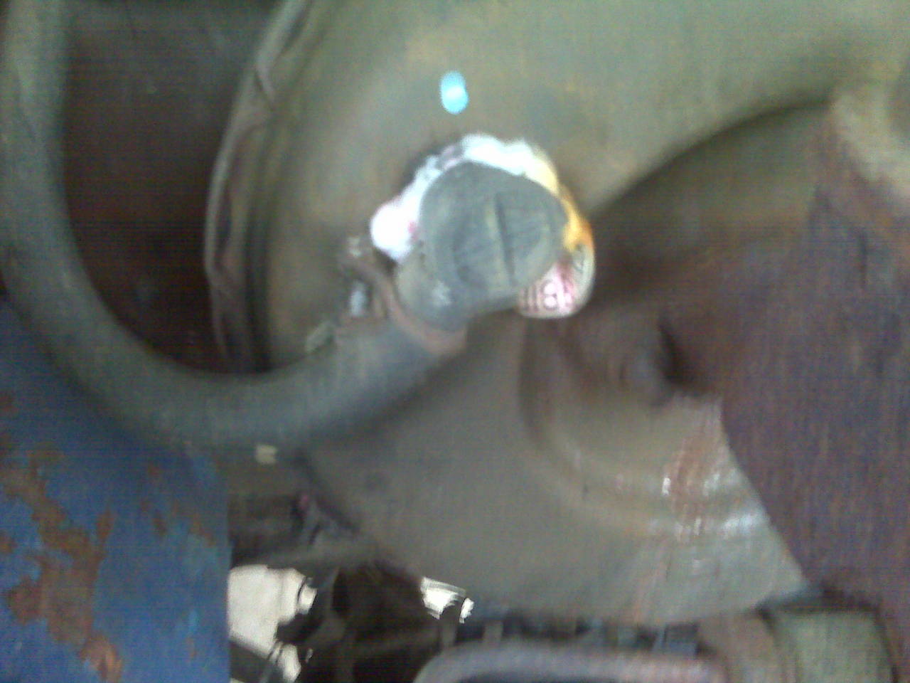 WTF is that holding the vacuum line in?